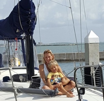 My son Wilson and I aboard our sailing vessel, First Light.