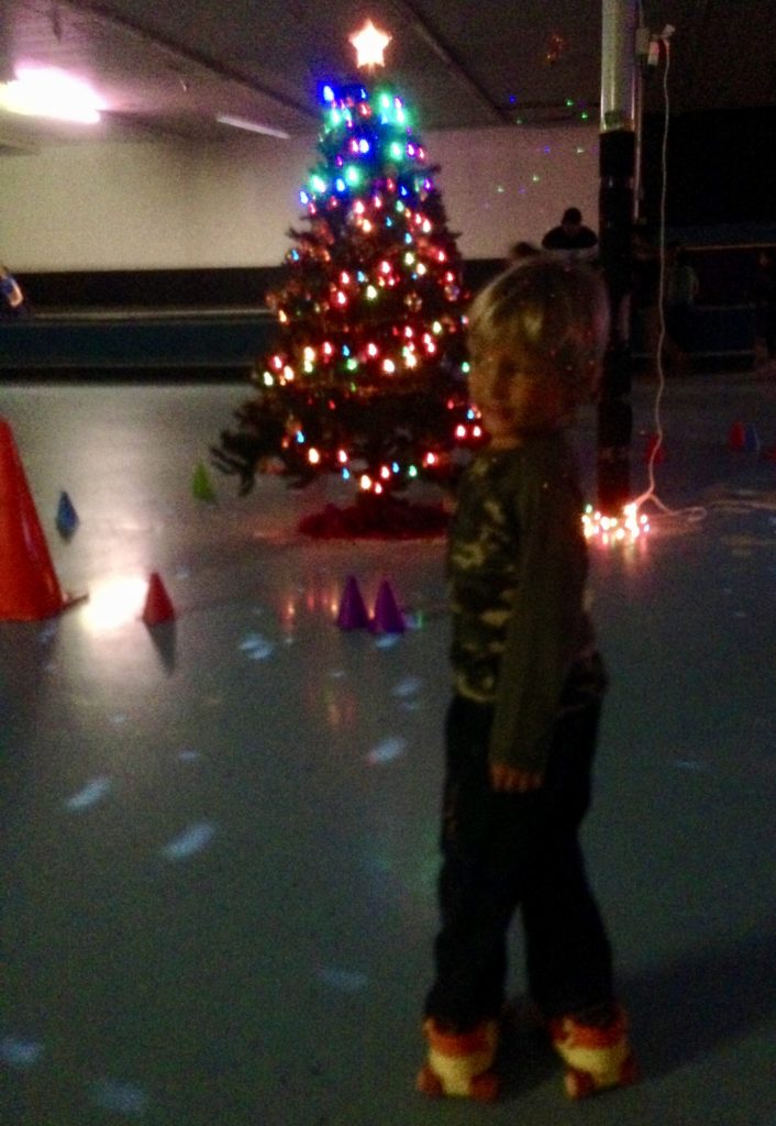 My son skating at a holiday rink party.
