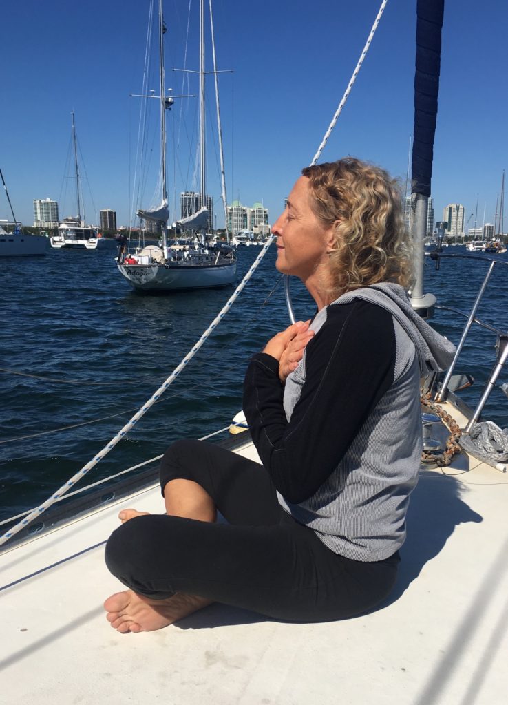Morning meditation sitting on the bow of our sailboat, bringing peace to our home.