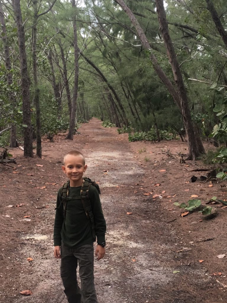 Hiking with my son through salt cedars.
